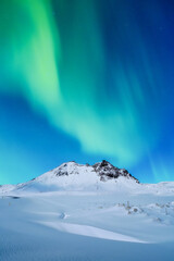 Wall Mural - aurora borealis. northern lights. nature. scandinavian countries. snow and ice on the mountains. win