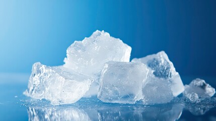 Poster - Close-up of several translucent ice cubes on a reflective surface against a blue backdrop.