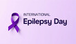 © Ksenia Pestereva - Purple ribbon banner showcasing International Epilepsy Day with space for important text and promoting awareness of epilepsy and cancer.