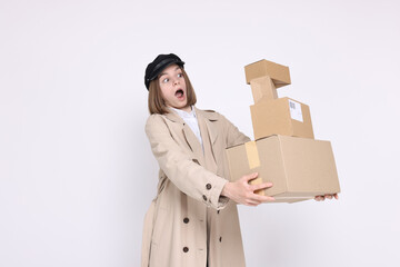 Poster - Emotional postwoman with parcels on white background. Space for text