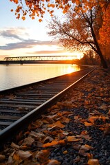 Aufkleber - Autumn Railway Tracks by Tranquil Lake with Vibrant Foliage and Sunset : Generative AI