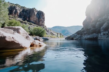Poster - Tranquil River Flowing Through Canyon in Sunlit Mountainous Landscape : Generative AI