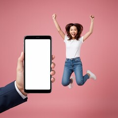 Full length of cheerful Asian woman jumping and smiling in air with showing cellphone blank screen with empty space for mobile app on screen. Isolated in studio pink background. Creative collage.
