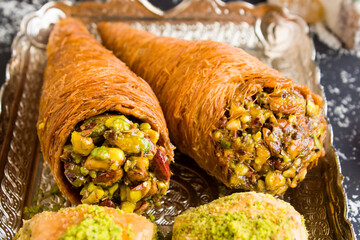 Traditional Turkish Dessert, two types of Baklava in a silver tray