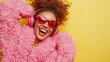 © andyaziz6 - Woman in Pink Fur Jacket Listens to Music Joyfully with Headphones and Sunglasses.