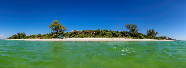 Wall Mural - Panoramic view of tropical island. Naples beach in sunny summer day, Florida. Summer vacation and tropical beach concept.