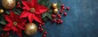 © piyawat - Festive Christmas Decorations Flat Lay on Dark Blue Background with Poinsettia Flowers, Baubles, and Red Berries.