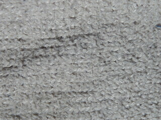 Poster - A fuzzy gray fabric with a few dark spots