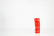 © Bordinthorn - Red blocks spelling the word 'RISK' on a plain background symbolize caution and assessment in decision-making.