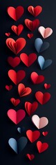 Canvas Print - Colorful paper hearts falling on dark background.