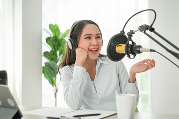content creator occupation concept. woman record audio in-home office by condenser microphone