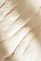 Poster - soft clay texture in warm beige tones with natural light reflections creating a serene and spacious 