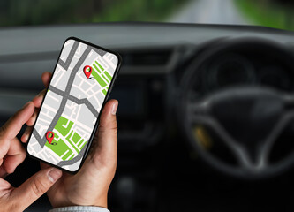 Poster - gps map ,man using a smartphone displaying a map in a car gps navigation system