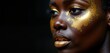 © Maryna - Black woman with golden makeup style bio-art. Studio portrait high fashion. Isolated background. Creative makeup design on face. Glamorous, beautiful. Elegant look. Tropical beauty trend. Model