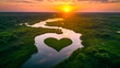 © Rezaul - Heart-shaped lake and winding river at sunset