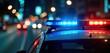 © Maryna - Police car with flashing lights at night in city. Emergency vehicle. Traffic control in city center. Law enforcement. Night. Safety. Transport. Emergency response. Possible crime scene. Safety, law.
