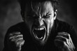 © Michael - Close-up black and white portrait of furious man screaming and clenching fists, expressing rage and frustration