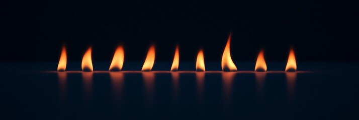 Poster - Eight small flames flicker on a reflective dark surface, casting a warm, inviting glow that dances in the surrounding darkness and creates a serene atmosphere