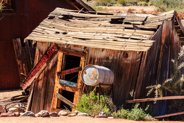 Wall Mural - A dilapidated shack with a sign that says 