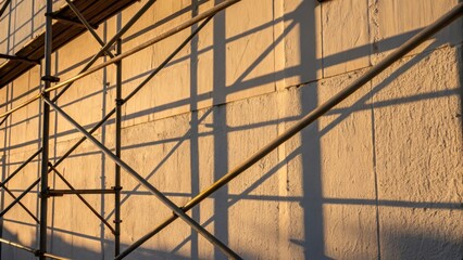 Aufkleber - A medium closeup of a fresh coat of paint on a wall with the shadows of scaffolding creating a gridlike pattern the late afternoon light enhancing the texture of the brush strokes.