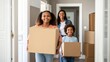 © DigitalSpace - Closeup of a family moving boxes into a brand new home their expressions filled with joy and optimism symbolizing new beginnings in affordable housing.