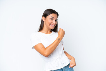 Wall Mural - Young caucasian woman isolated on white background celebrating a victory