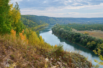 Wall Mural - autumn landscape, view from the high bank of the sylva river valley.