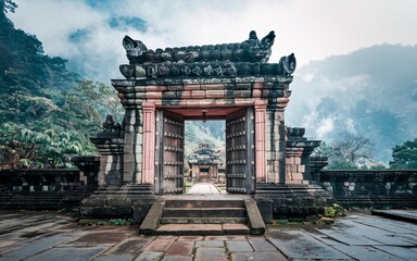 Wall Mural - Ancient stone gate opens to misty mountains.