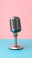 Poster - Silver vintage microphone stands on a vibrant two tone pastel pink and blue background, creating a visually appealing setup for singing, recording, broadcasting, or podcasting