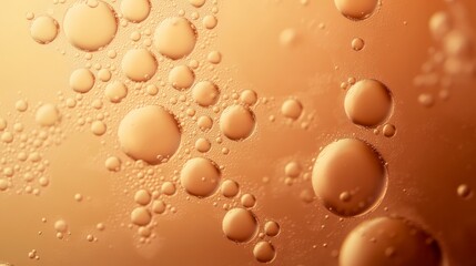 Poster - Golden light illuminates a mesmerizing pattern of bubbles and ripples on a water surface, creating an abstract texture with a soothing and calming effect