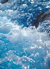 Poster - Dynamic splash of crystal clear water with white foam and droplets against vibrant blue background, perfect for freshness, purity, and nature-themed designs and advertising campaigns.