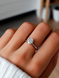 © Daniella - Solitaire Diamond Ring on Woman's Hand