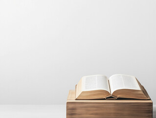 Wall Mural - Open Book on Wooden Stand Against White Background: Minimalist Reading Concept