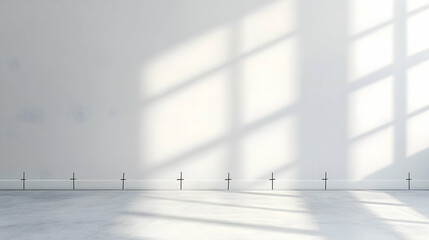 Wall Mural - A minimalist interior space with shadows on a plain wall and concrete floor.