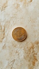 Aufkleber - Gleaming golden bitcoin sits on a textured, mottled surface, symbolizing the tangible nature of cryptocurrency investment and its potential in modern finance