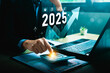 © Sutthiphong - Business Analyst Forecasting 2025 Financial Growth with Calculator, Laptop, and Rising Graph Indicators Showing Investment Strategy, Economic Trends, and Revenue Optimization