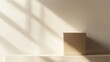 © Thinnawat - Minimalist Scene Featuring a Simple Brown Box on a White Surface Bathed in Natural Light with Distinctive Shadow Patterns Creating a Serene Atmosphere