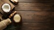 © Sinechana - 13.Bottle of Coconut Oil on Wooden Background