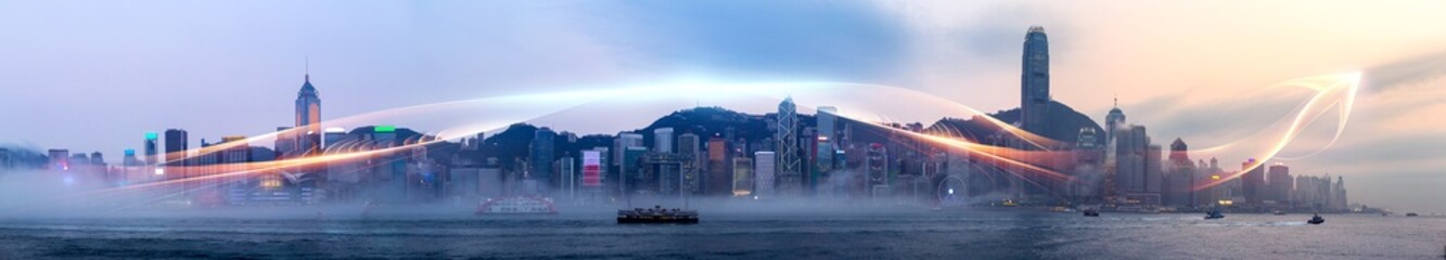 Poster - Misty Hong Kong skyline at dawn, city skyscrapers shrouded in fog, with streaks of light suggesting movement.