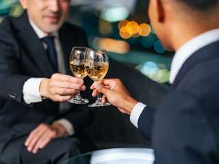 Poster - toast, champagne, drinking, business, businessman, party, glass, wine, suit, businessperson, people, night view, event, hand, close-up, body parts, no face, alcohol, entertainment, company, management