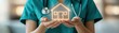 © Alohanongza - A healthcare professional holds a glowing house symbol, representing the connection between medical care and home health.