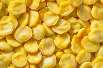 Wall Mural - Big amount of yellow raw fava beans. Image illustrated food for advertisement