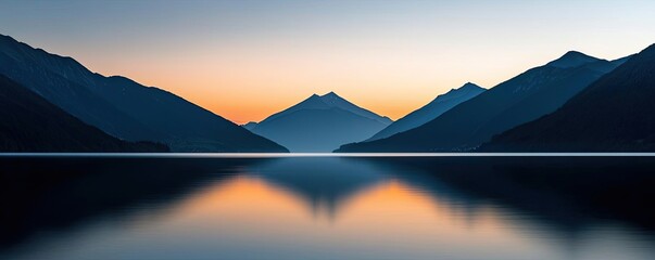 Poster - Symmetry gradient concept. Serene mountain landscape at sunset with calm waters reflecting a colorful sky.