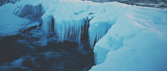Poster - Majestic frozen waterfall with icy textures in a serene winter landscape