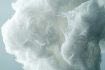 Poster - A clear and fluffy white cloud floating in a bright blue sky
