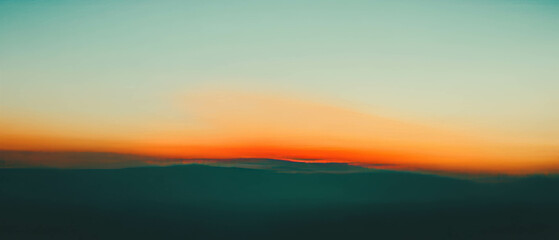 Aufkleber - Smooth gradients blend calming pastel shades in a serene landscape at dusk