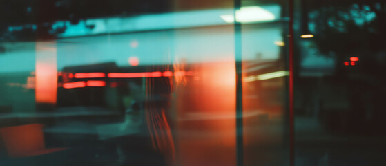 Poster - Urban evening glow reflected in glass with retro vignette and soft focus details