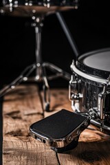 Poster - A cell phone placed on a wooden table, perfect for a workspace or study area