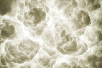 Aufkleber - A collection of clouds in various shapes and sizes forming against a gray background