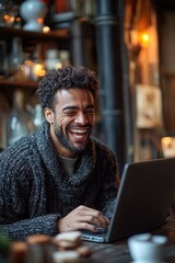 Poster - a person sitting at a table with a laptop, focused on work